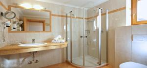 a bathroom with a shower and a sink at Sportalm Apartments in Leutasch
