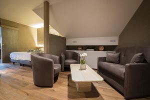 Posezení v ubytování Auberge au Boeuf