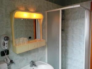 Koupelna v ubytování Hotel Clodia + 37 fotografií