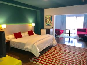 Кровать или кровати в номере Hotel Ritual Torremolinos- Adults Only