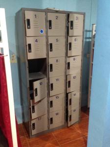 a bunch of boxes stacked on top of each other at Rehab Hostel in Phi Phi Islands
