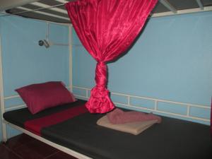 Postel nebo postele na pokoji v ubytování Rehab Hostel