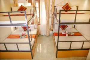 Voodi või voodid majutusasutuse Hanoi City Backpackers Hostel toas