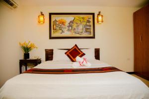 Voodi või voodid majutusasutuse Hanoi City Backpackers Hostel toas