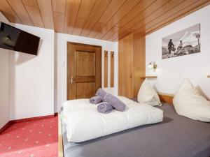 Posteľ alebo postele v izbe v ubytovaní Apart Garni Enzian