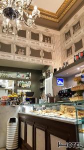 A restaurant or other place to eat at Hotel Youri Il Magnifico