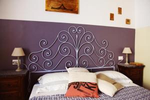 A bed or beds in a room at Trastevere Dream House
