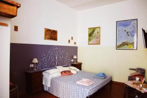 A bed or beds in a room at Trastevere Dream House
