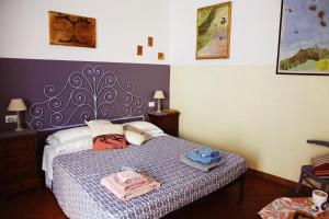 A bed or beds in a room at Trastevere Dream House