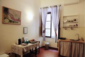 A kitchen or kitchenette at Trastevere Dream House