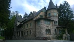 a large stone building with a tower on top at Holiday Home Dželalija in Stara Sušica