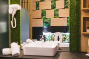 Koupelna v ubytování Hotel Allur