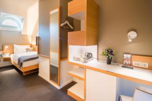 Giường trong phòng chung tại Best Western Plus Hotel Zürcherhof