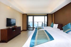 Fotografie z fotogalerie ubytování 惠东巽寮湾无敌海景公寓 v destinaci Huidong