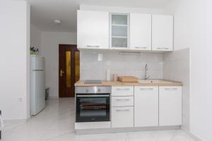 Kuchyňa alebo kuchynka v ubytovaní Ratak House