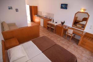 A kitchen or kitchenette at Lambis Studios & Apartments