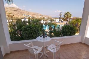 The swimming pool at or close to Lambis Studios & Apartments