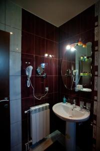 Koupelna v ubytování Hotel Luka's