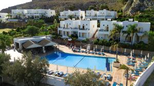 an aerial view of a resort with a swimming pool at Lambis Studios & Apartments in Lindos