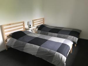 Postel nebo postele na pokoji v ubytování LATYKA B&B