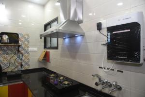 Una cocina o cocineta en Square Suite