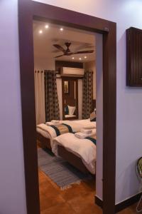 Una cama o camas en una habitación de Square Suite