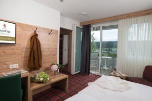 Postel nebo postele na pokoji v ubytování Hotel Kammerer