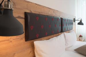 Postel nebo postele na pokoji v ubytování Hotel Kammerer