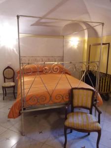 Postel nebo postele na pokoji v ubytování B&B Villa Tonelli