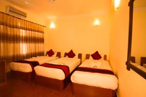 Posteľ alebo postele v izbe v ubytovaní Hotel Atlantic