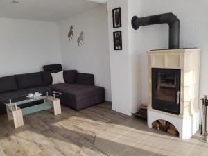 Ein Sitzbereich in der Unterkunft Fehnhaus, Nordsee, Nähe Norddeich