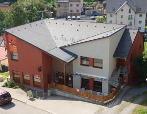 an overhead view of a red and white building at Penzion Dena in Jihlava