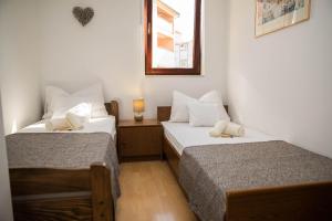 Postel nebo postele na pokoji v ubytování Apartman Ruzica Crikvenica