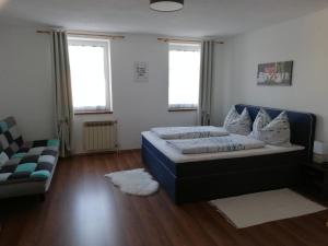 Posteľ alebo postele v izbe v ubytovaní Gästezimmer Glaser