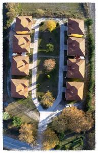 an overhead view of a yard with houses and a street at Paradise Studios in Kato Loutraki