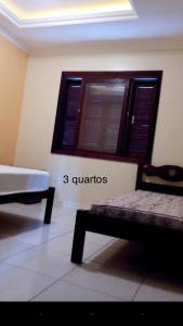 Vonios kambarys apgyvendinimo įstaigoje Casa 3 dormitórios