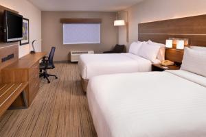 a hotel room with two beds and a television at Holiday Inn Express Walnut Creek by IHG in Walnut Creek