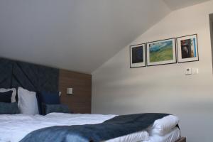 Postel nebo postele na pokoji v ubytování Sleep Inn Prishtina