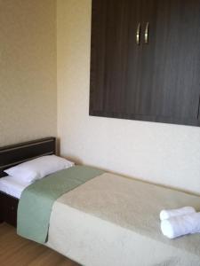 Postelja oz. postelje v sobi nastanitve Guest House Kakheti