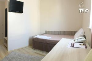 Letto o letti in una camera di Garni Hotel Tri O