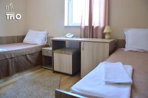 Letto o letti in una camera di Garni Hotel Tri O