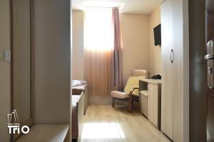 Letto o letti in una camera di Garni Hotel Tri O