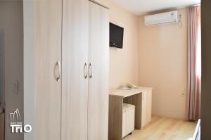 TV o dispositivi per l'intrattenimento presso Garni Hotel Tri O
