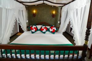 Postel nebo postele na pokoji v ubytování Goyambokka Guesthouse