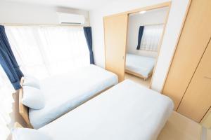 COCOSTAY Felice客房内的一张或多张床位