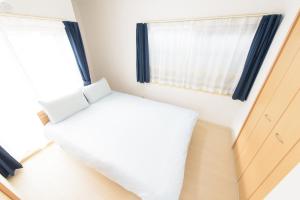 COCOSTAY Felice客房内的一张或多张床位