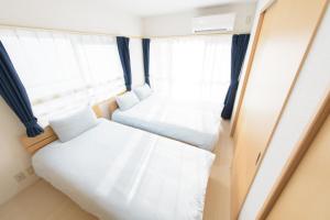 COCOSTAY Felice客房内的一张或多张床位