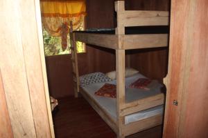 En eller flere senge i et værelse på Batad Transient House