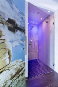 Phòng tắm tại Alpensporthotel Mutterberg