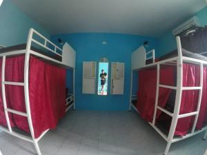 Postel nebo postele na pokoji v ubytování Rehab Hostel